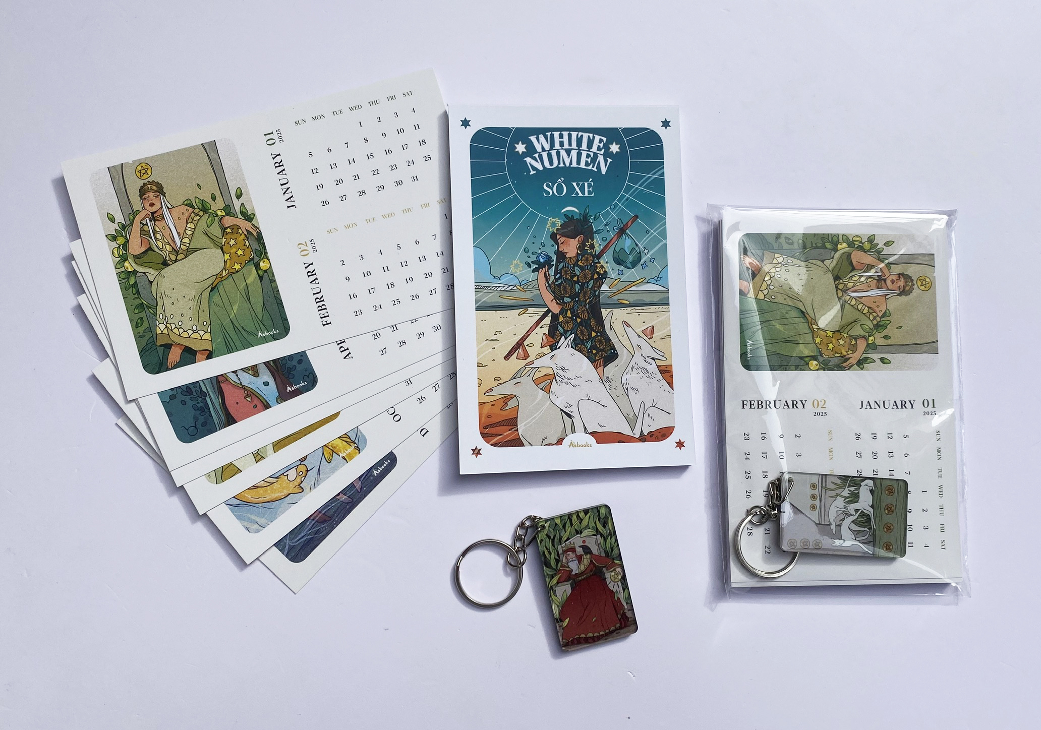 boxset white numen tarot (bộ bài + sách hướng dẫn) - tặng kèm bộ quà all-in: sổ xé in bìa art bài + bộ postcard in hình art bài kèm lịch 2025 + móc khóa in art bài random
