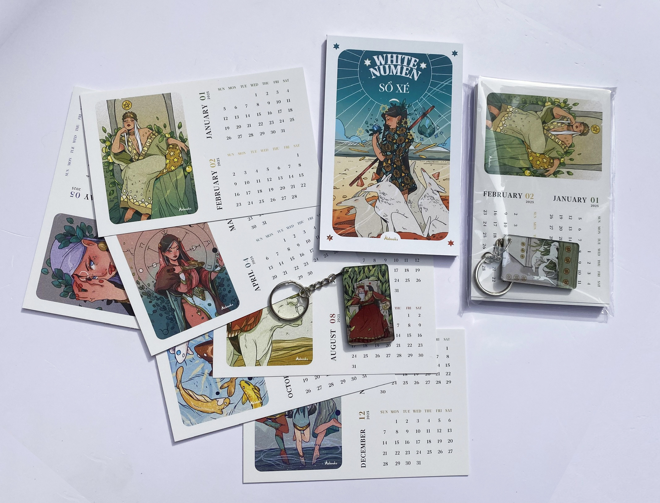 boxset white numen tarot (bộ bài + sách hướng dẫn) - tặng kèm bộ quà all-in: sổ xé in bìa art bài + bộ postcard in hình art bài kèm lịch 2025 + móc khóa in art bài random