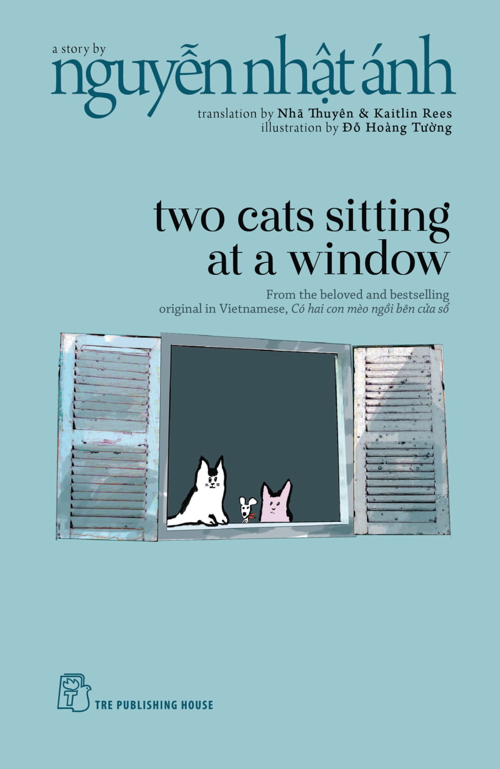 Two Cats Sitting At A Window